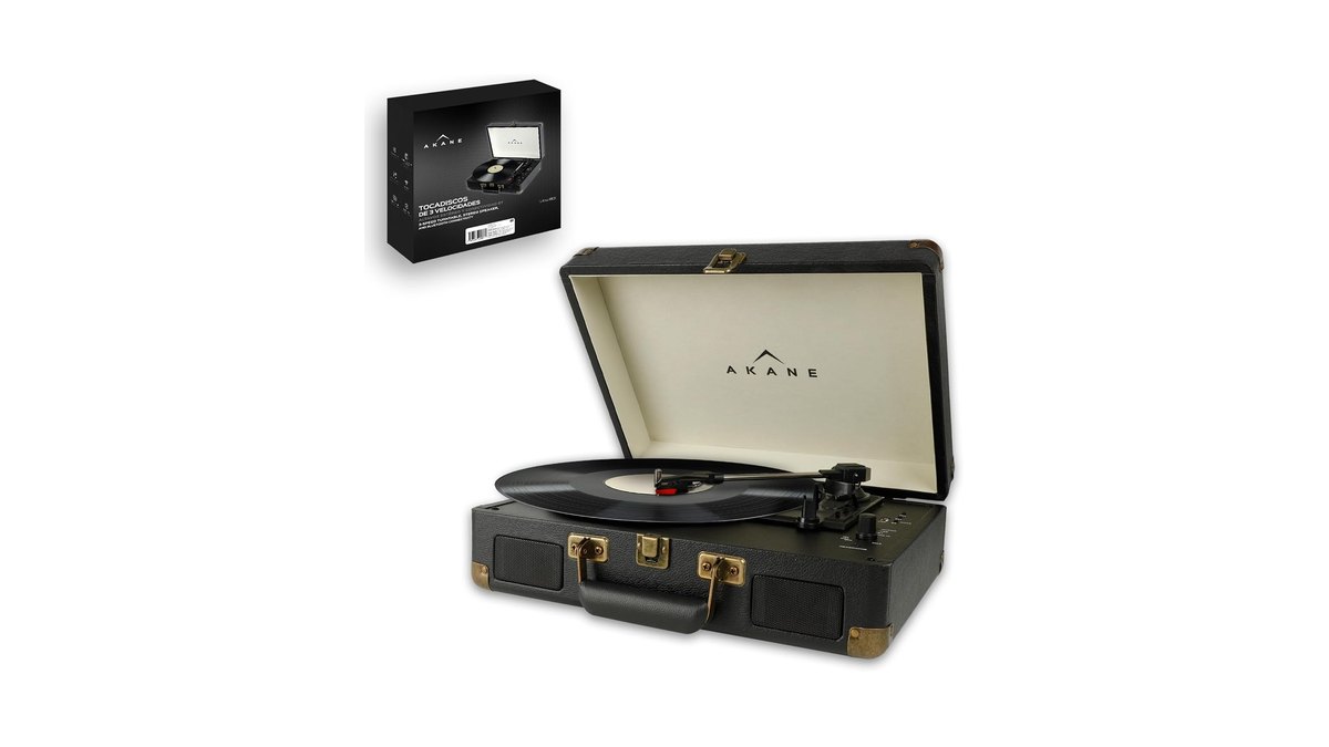 Tornamesa portátil con bocinas integradas y un disco de vinilo puesto.